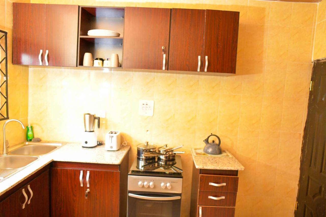 Living Green Apartments Airport Pick Up ベニンシティ エクステリア 写真